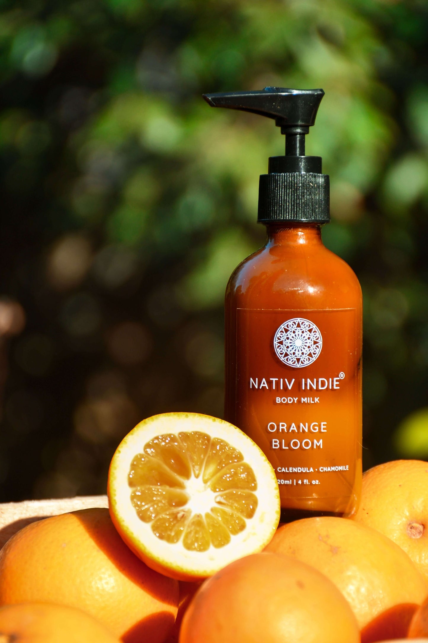 Orange Bloom Body Milk with Mandarin Orange and Calendula; organic skincare product with natural ingredients from the Himalayas for raw beauty.